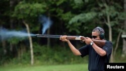 Президент США Барак Обама на стрельбище в Кемп-Дэвиде