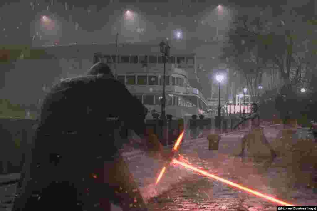 A Star Wars lightsaber battle lights up a riverbank in Rostov-on-Don. Zubkov, who also created this image, says he uses Photoshop to create his works and each takes around half a day to complete.&nbsp;