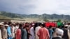 Mourners carry the coffin of an Afghan security member of a border post killed by Taliban fighters, during a funeral in Dande Patan district of Paktia Province on May 29.