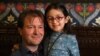 Richard Ratcliffe, husband of British-Iranian aid worker Nazanin Zaghari-Ratcliffe jailed in Tehran since 2016, holds his daughter Gabriella during a news conference in London, on October 11, 2019. - The five-year-old daughter of a British-Iranian woman j