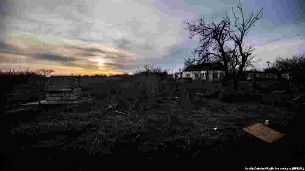 As the sun sets behind the village, fighters on both sides of the conflict prepare for the nightly firefights of a war that is fought largely after dark. The war between Russia-backed separatists and the Ukrainian military has raged for nearly four years and killed more than 10,000 people. 