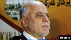 Iraqi Prime Minister Haidar al-Abadi has ordered an investigation into the abduction of a journalist in Baghdad (file photo) 