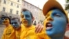 Ukrainian fans cheer at a fan zone ahead of the Euro 2012 match with Sweden in central Lviv.