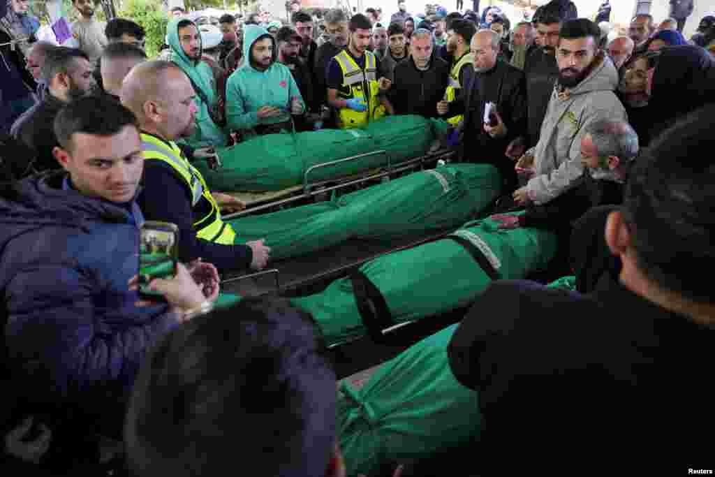 Mourners attend a funeral in Sidon, Lebanon, on April 10 for people killed in an Israeli strike that hit a cafe. 