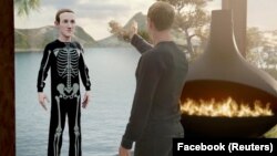 Mark Zuckerberg "comunicând" cu avatarul său, în cadrul prezentării "Meta". 28 octombrie 2021. 