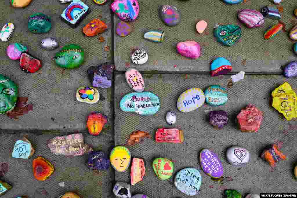 Stones painted by children with messages of support for Nazanin Zaghari-Ratcliffe, the British-Iranian woman who has been detained in Iran for more than five years, are seen outside the Foreign Office in London. Richard Ratcliffe, her husband, has gone on a hunger strike to draw attention to her case. She&nbsp;was first jailed in 2016 after being accused of plotting against the regime -- charges that she, her supporters, and rights groups deny.