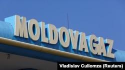 The logo of the Moldovan natural-gas company, MoldovaGaz