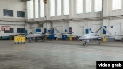 Ukrainian Bayraktars in a hangar in an undated photo