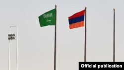 Saudi Arabia - Saudi and Armenian national flags fly at Riyad airport, October 27, 2021.