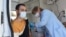 A man is vaccinated against coronavirus at a mobile vaccination center in Yerevan last month.