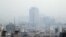 A general view shows smog obscures buildings in Tehran, December 5, 2018