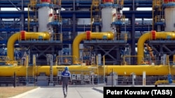 A worker walks near the Gazprom-operated Slavyanskaya compressor station, the starting point of the Nord Stream 2 offshore natural gas pipeline. (file photo)