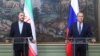 Russia - Russian Foreign Minister Sergei Lavrov (right) and his Iranian counterpart Hossein Amir-Abdollahian hold a joint news conference, Moscow, October 6, 2021.