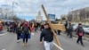 Protesters attend a rally organized by Calin Georgescu's supporters in front of Bucharest's Palace of Parliament on January 10