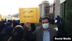 Iranian teachers protest for better pay in Tehran on December 13.