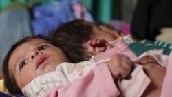 Afghan Father Says He Must Sell One Of His Newborn Triplets