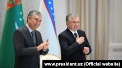 Қурбонқулӣ Бердимуҳаммадов ва Шавкат Мирзиёев 