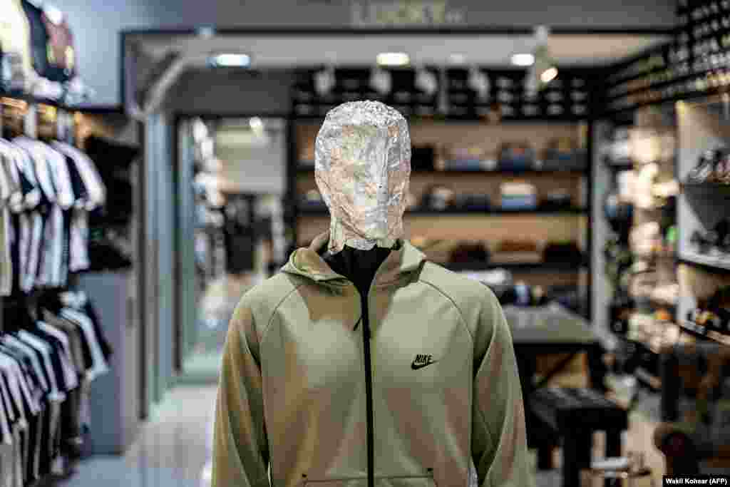 A mannequin in a clothing store with its face covered by foil.One hadith states: “Those who try to make the like of Allah's creations will receive the severest punishment on the Day of Resurrection.”