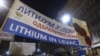 Protesters in Belgrade hold up a sign against a planned lithium mine in western Serbia on November 24. 