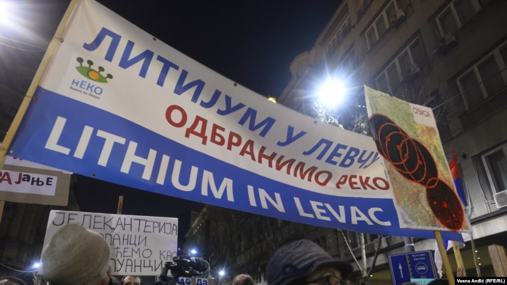 Protesters hold a sign against a planned lithium mine in western Serbia. 