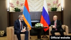 Armenian Prime Minister Nikol Pashinian and Russian President Vladimir Putin during their meeting in Sochi, Russia, November 26, 2021.