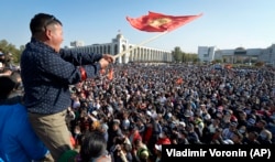 People protest during a rally against the results of a parliamentary vote in Bishkek in October 2020.