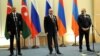 Azerbaijani President Ilham Aliyev (left to right), Russian President Vladimir Putin, and Armenian Prime Minister Nikol Pashinian speak at a press briefing in Sochi, Russia, on November 26.