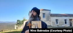 Orthodox priest Ioseb Burjanadze at the Gelati Monastery.