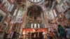 Part of the interior of the Gelati Monastery. The mosaic in the center shows the Virgin Mary with child, flanked by two archangels.