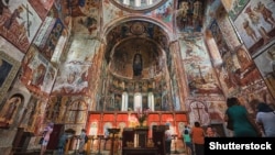 Part of the interior of the Gelati Monastery. The mosaic in the center shows the Virgin Mary with child, flanked by two archangels.