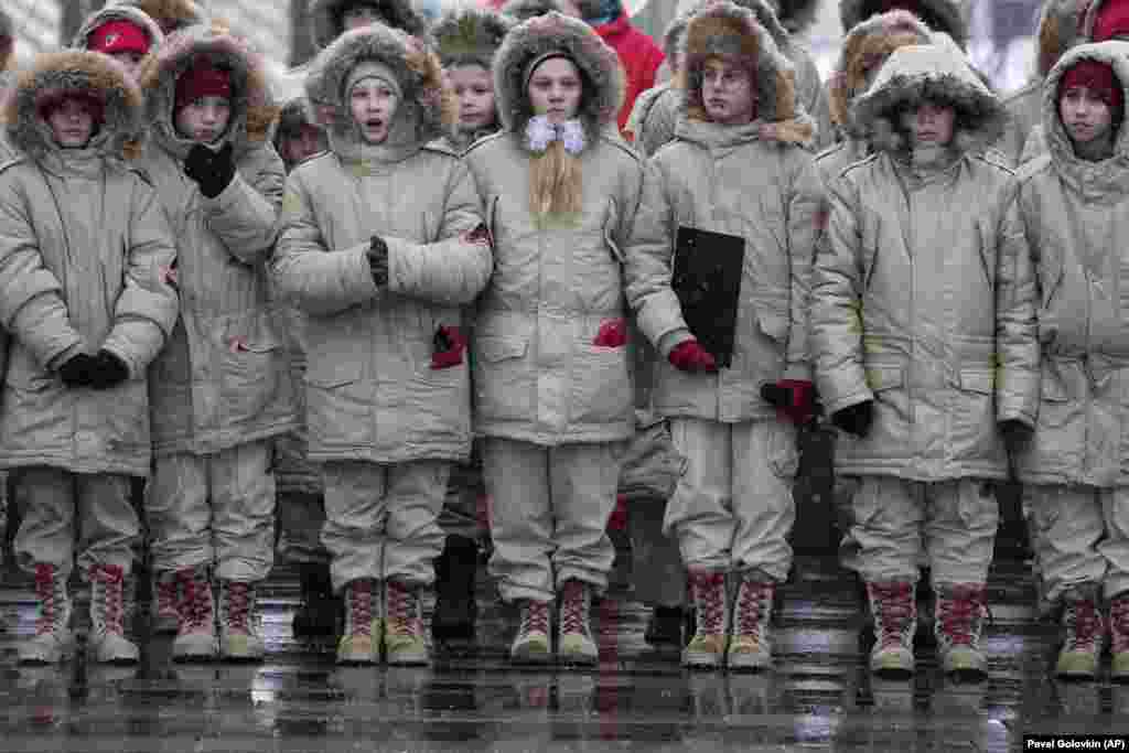 Members of the Russia&#39;s Young Army Cadets National Movement stay in formation as they commemorate the 80th anniversary of the Battle of Moscow, in a park outside the Russian capital on December 5.&nbsp;