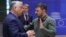 Hungarian Prime Minister Viktor Orban (left) talks with Ukrainian President Volodymyr Zelenskiy during the European Council Summit in Brussels on June 27.