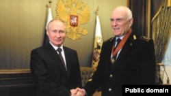 Президент Владимир Путин и ректор Санкт-Петербургского горного университета Владимир Литвиненко