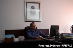 Perica Babic, the lawyer for the Ivkovic family and other villagers, sits in his office in Livno, Bosnia-Herzegovina in August 2023.