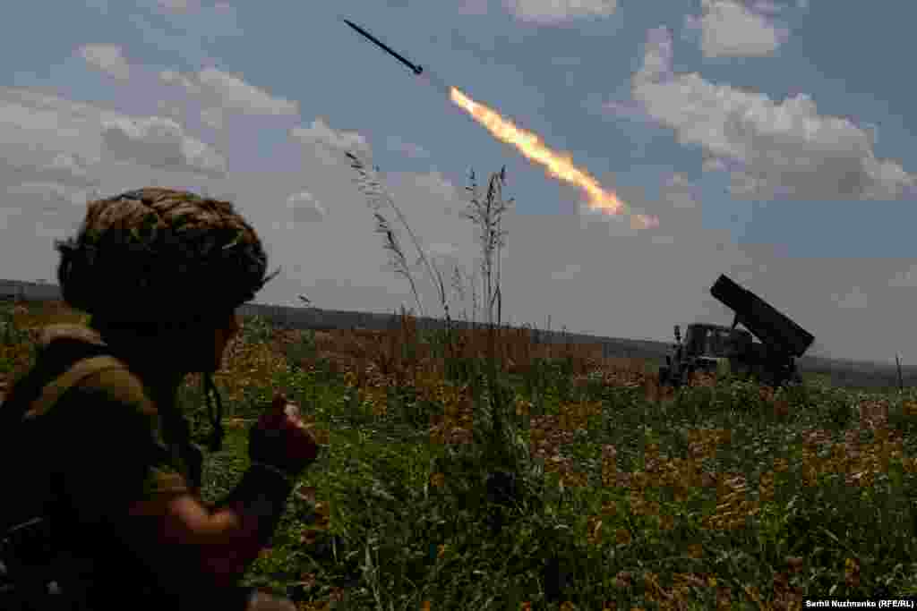 Ukrainian soldiers of the 47th Magura Separate Mechanized Brigade fire a BM-21 Grad multiple-launch rocket system toward Russian troops near the front line in Zaporizhzhya.