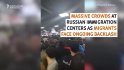 Migrants Wait In Line 'For Days' For Papers, Fearing Deportation From Russia