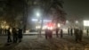 People gather in the street after fleeing apartment buildings foll;owing the earthquake in Almaty, Kazakhstan, late on January 22. 