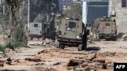 Izraelski konvoj oklopnih vozila odlazi nakon racije u kampu za palestinske izbjeglice Nur Šams, nakon talasa nasilja na Zapadnoj obali, 21. marta 2024.