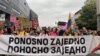 Sarajevo, Bosnia and Herzegovina -- The front row of the Pride march carrying a banner