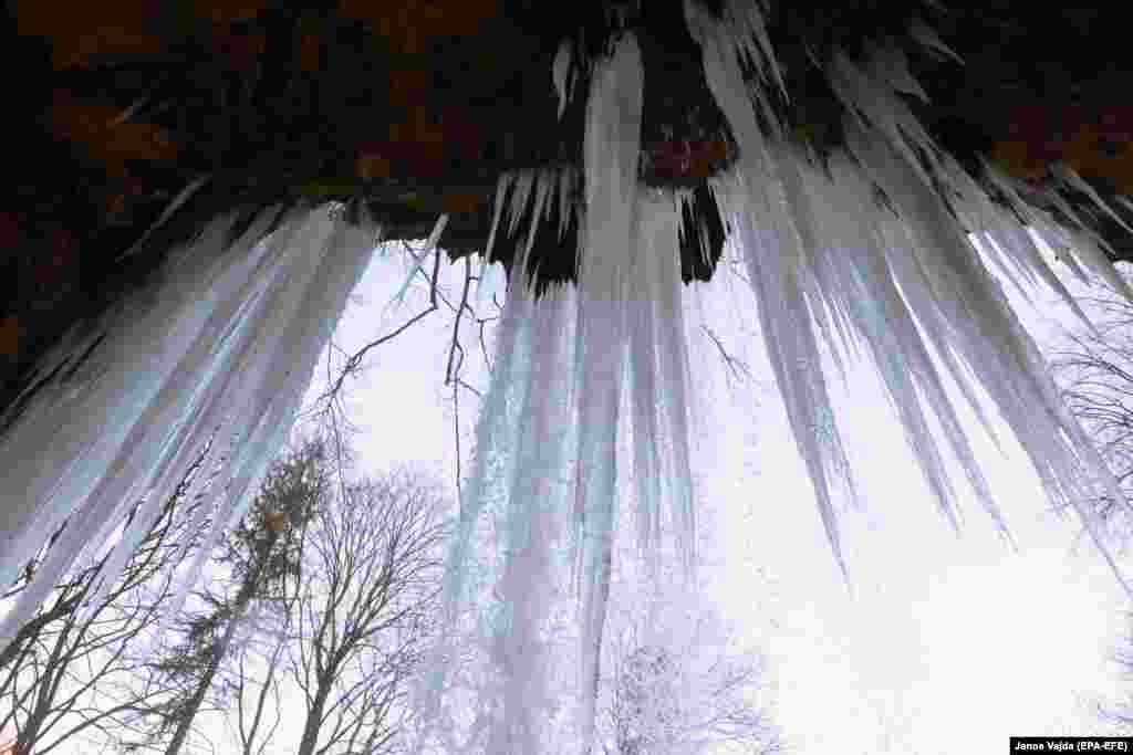 Icicles hang from the partially frozen Lillafured Waterfall in Miskolc, northeastern Hungary.