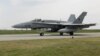 A F-16 jet taxis on a runway in Borcea, Calarasi, Romania, on May 15.
