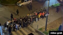 Tajiks being arrested in the the town of Kotelniki last week. There have been several reports of Tajik migrants being rounded up or beaten in recent days by police in Russia. 