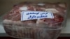 People shop in a store in Tehran