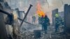 In a handout photo from Ukraine's Emergency Service, firefighters work at the site of a Russian missile strike in Odesa on March 15. 