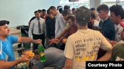 Tajik migrants stranded at Moscow's Vnukovo airport in early July