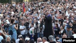 Armenia - Archbishop Bagrat Galstanian addresses supporters rallying outside the parliament, Yerevan, June 17, 2024.