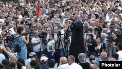 Archbishop Bagrat Galstanian addresses supporters in Yerevan on June 17. 
