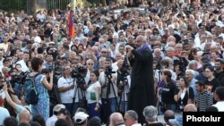 Armenia - Archbishop Bagrat Galstanian addresses supporters rallying outside the parliament, Yerevan, June 17, 2024.