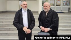 Muharem Stulanovic (left) and his lawyer Duško Tomic speak to reporters outside the court in Banja Luka on February 29.