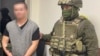 The 22-year-old Kazakh man is suspected of joining an armed group in Syria. 